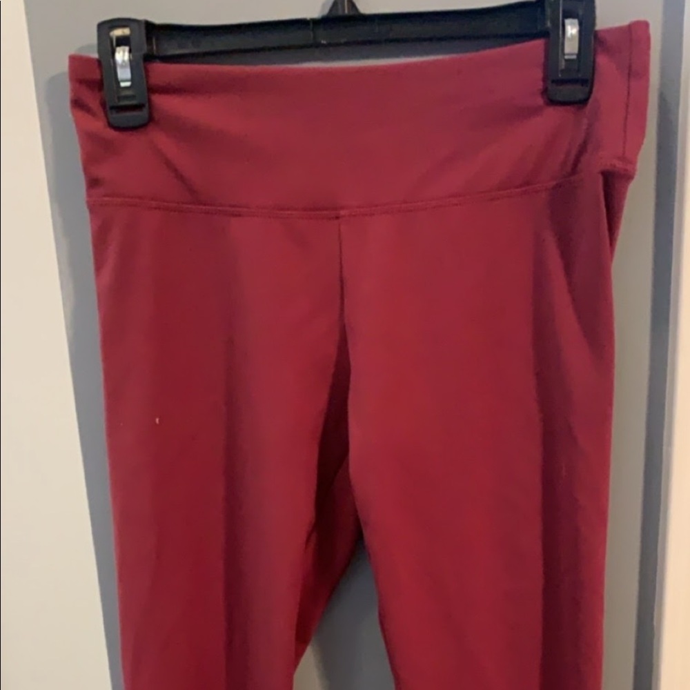 Maroon leggings with criss cross detail